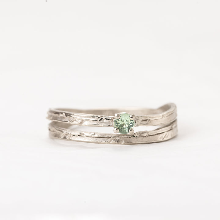 Split Shank Green Sapphire Ring made of 14K White Gold