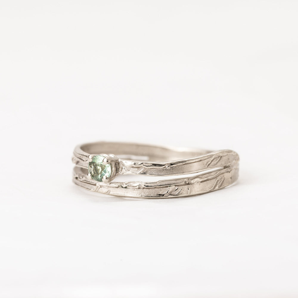 Split Shank Green Sapphire Ring made of 14K White Gold